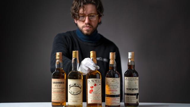 Joe Wilson, Whisky Auctioneer with Emmanuel Dron's Collection of Signed Samaroli Bottles